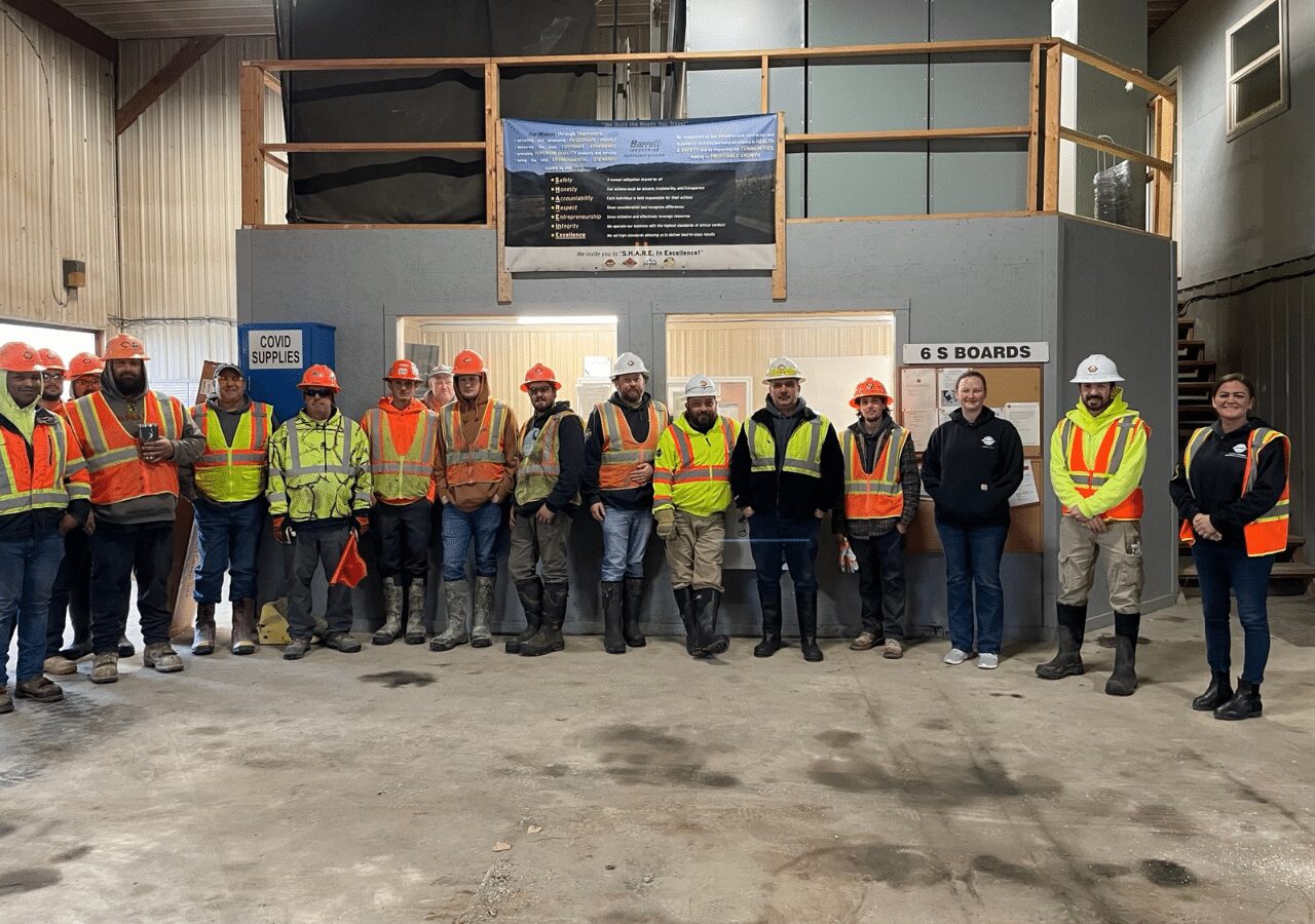 Barrett Paving's Northeast Division team in safety gear celebrates Earth Day at a New York facility.